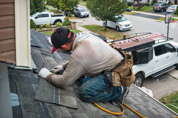 Professional Roofing technician working in Columbia, IA